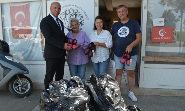 Şefkatli ellerden yoksul öğrencilere 102 çift ayakkabı desteği